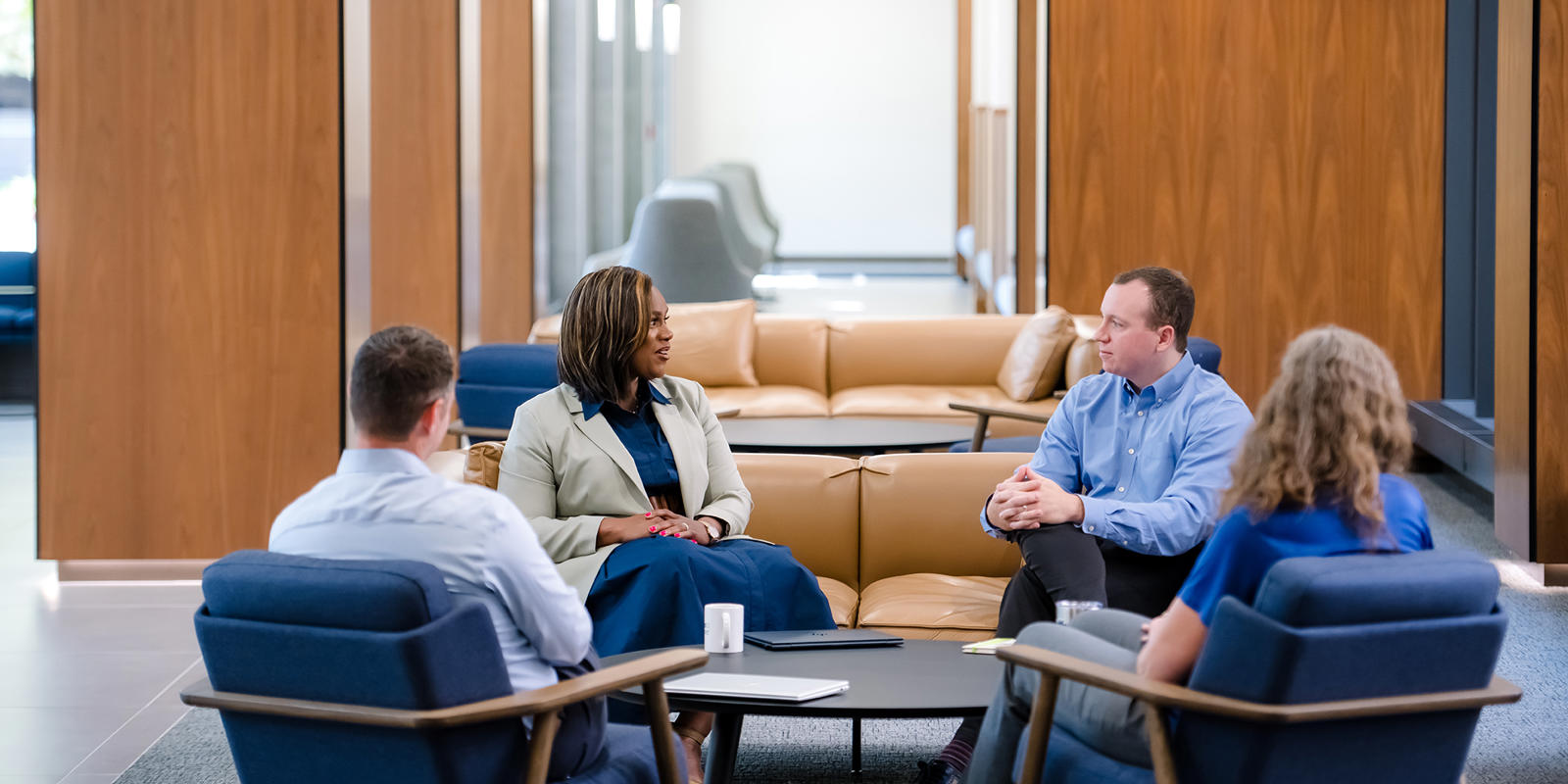 a group of people sitting in a circle