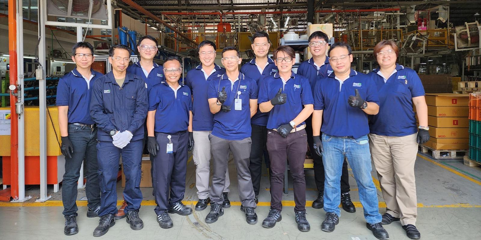 a group of people posing for a photo