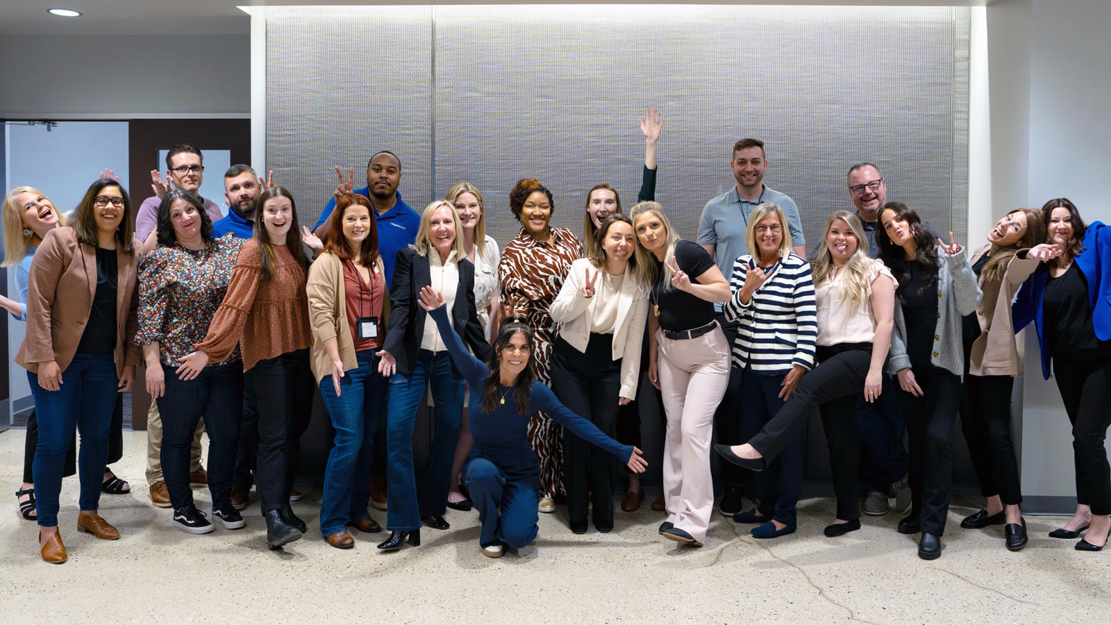 a group of people posing for a photo