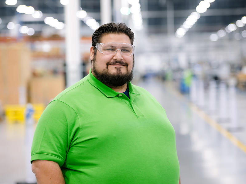 a person in a green shirt