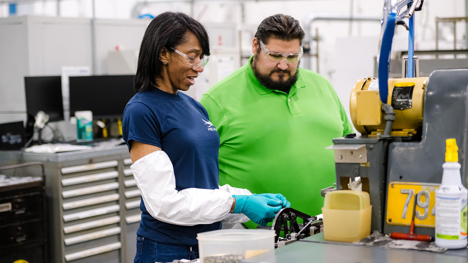 a person and person in a factory